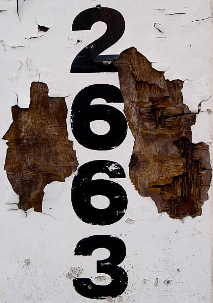 istock Old, corroded building number painted on the wall 140407060