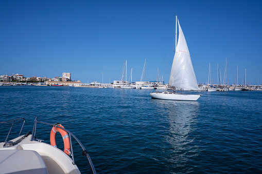 Torrevieja port harbor in Alicante Spain Costa Blanca view from yacht boat in a sunny blue Mediterranean day sailboat