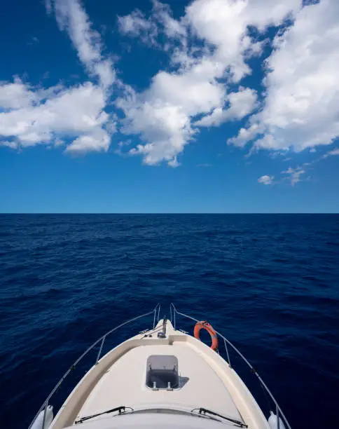 Yacht boat sailing in the blue sea in summer blue sky vacations paradise concept