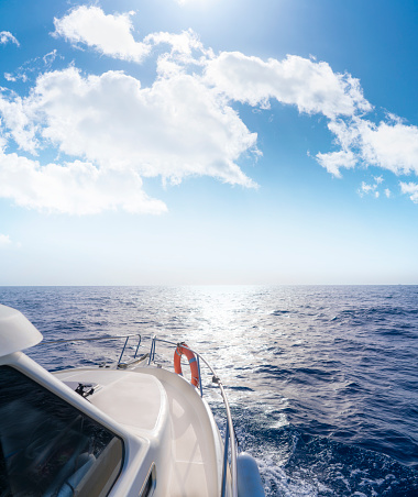 Yacht boat sailing in the blue sea in summer blue sky vacations paradise concept