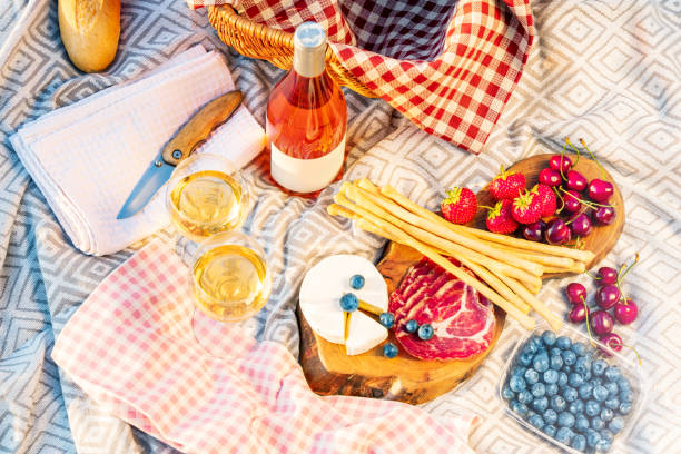 istock Picnic setting on a blanket in a summer meadow. 1404076694