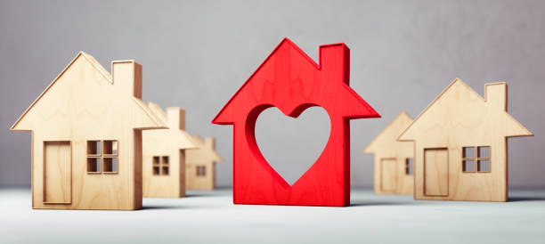 istock Red toy house with heart 1404077037