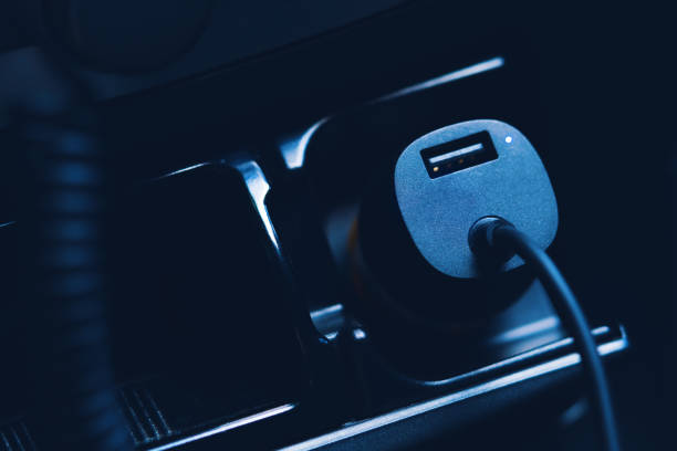 istock USB car charger connected to the car cigarette lighter. 1404077738