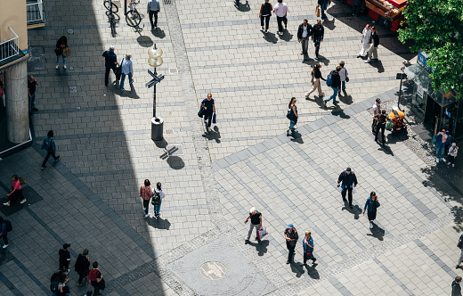 A high angle view of a busy pedestrian crossing Marienplatz, Munich, Germany