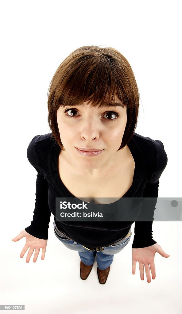 What can I do? Young woman gesturing ""What can I do"" Looking Up Stock Photo