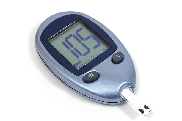 A blood glucose monitor for diabetes testing, showing a normal sugar result of 105.