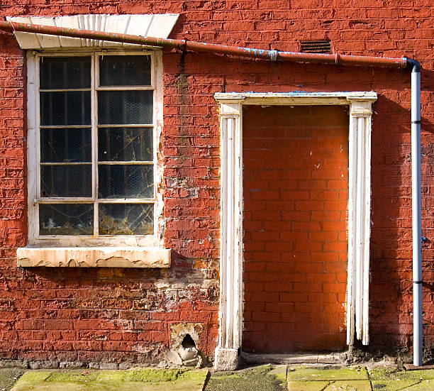 istock Old ruined red-brick building - the door. 140407974
