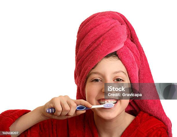 The Girl Cleans A Teeth Stock Photo - Download Image Now - Adolescence, Adult, Animal Hair