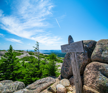 The rocky summit of Pemetic mountain in Maine on a sunny day in the summer