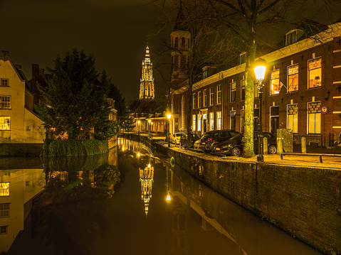 Beautiful Dutch street at night on canal side in Amersfoort, Netherlands