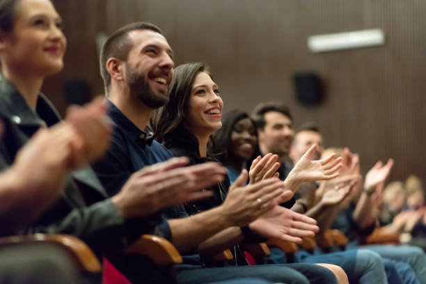 istock Happy audience applauding in the theater 1404083579