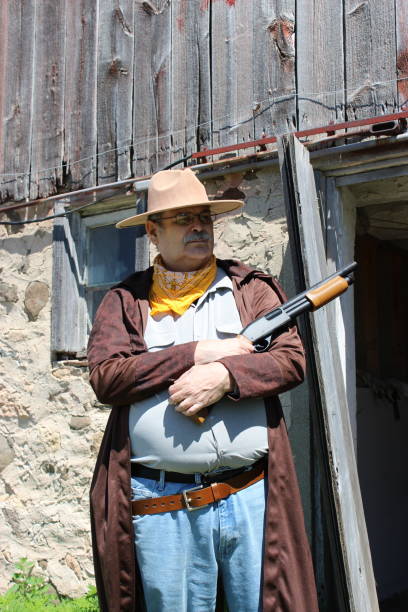istock older male Cowboy 1404084942