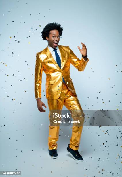 Man Dancing Amidst Confetti Stock Photo - Download Image Now - Confetti, Full Length, Business
