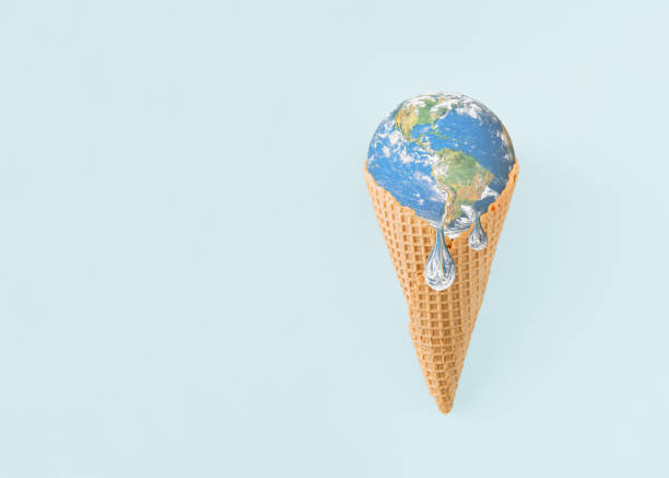 istock Planet Earth is melting in ice cream cone on isolated pastel blue background. Minimal concept of warming, melting, pollutions. Anti-war idea. Dystopian climate change future. World provided by NASA. 1404090509