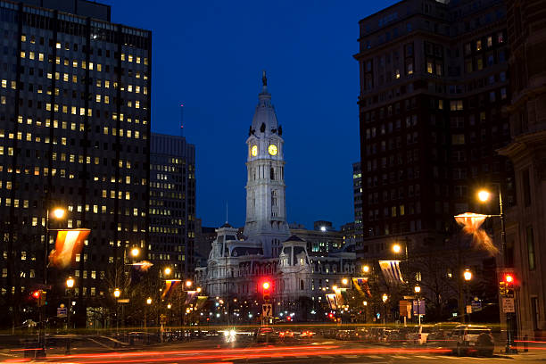 Philadelphia city center Philadelphia downtown and city hall with night lights benjamin franklin parkway photos stock pictures, royalty-free photos & images