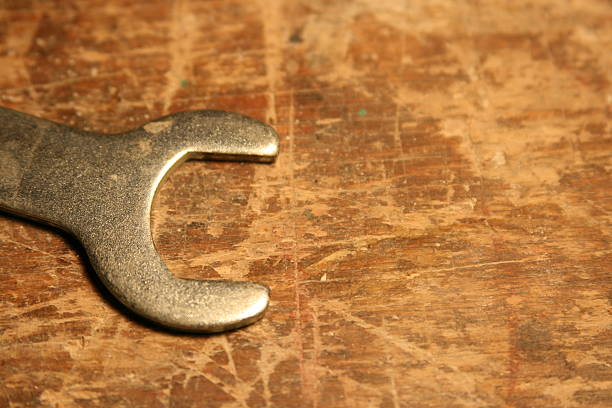 istock End of wrench on textured Back ground 140409686