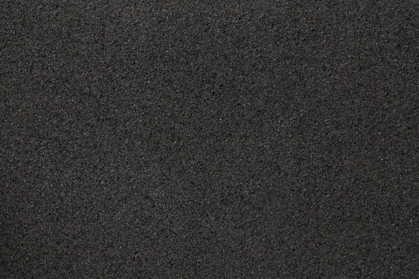 textura de la estructura de la esponja negra - goma material fotografías e imágenes de stock