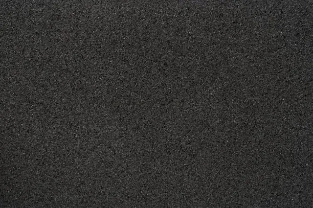 Photo of Black sponge structure texture