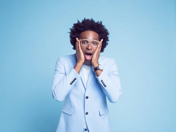 istock Surprised businessman with mouth open 1404096996