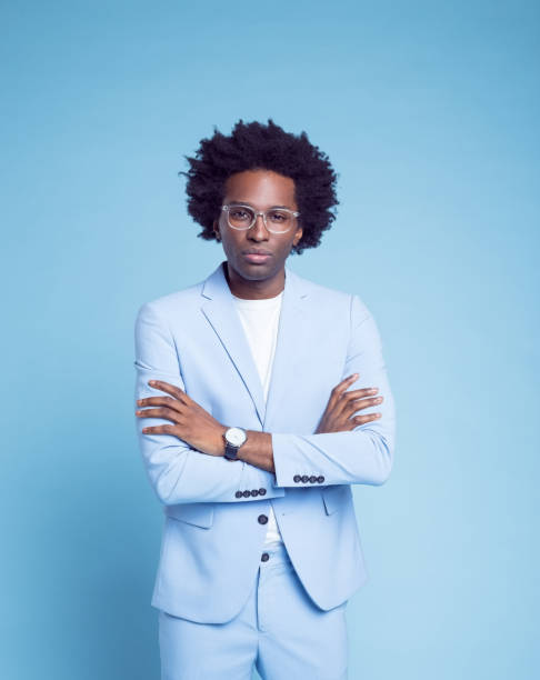 istock Man in blue blazer with arms crossed 1404097780