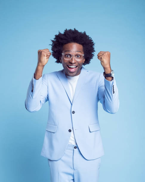 istock Happy businessman clenching fists 1404098539