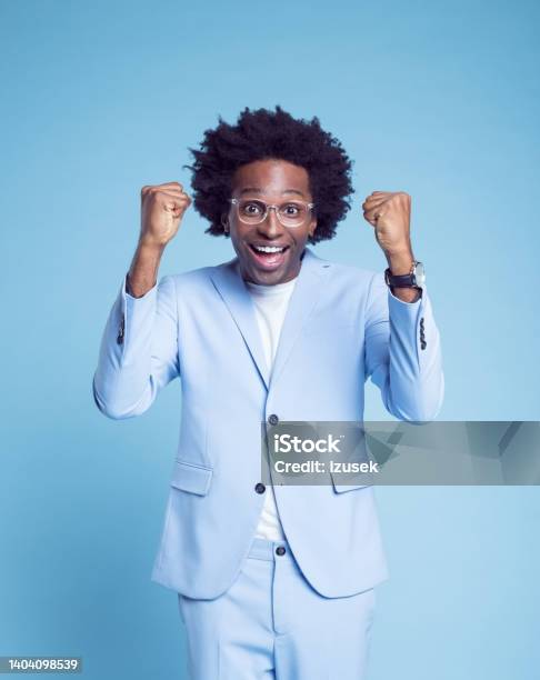 Happy Businessman Clenching Fists Stock Photo - Download Image Now - 30-34 Years, Achievement, Adult