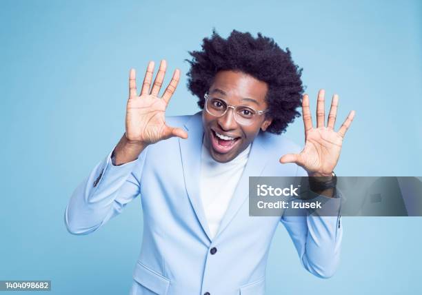 Cheerful Man In Blue Blazer Gesturing Stock Photo - Download Image Now - 30-34 Years, Adult, Adults Only