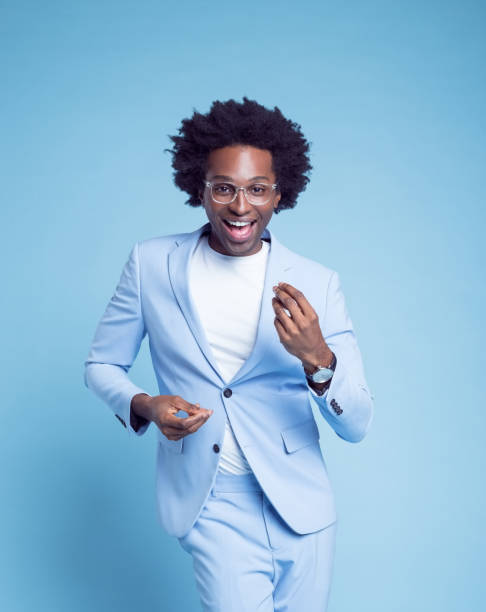 istock Businessman snapping fingers and dancing 1404099356