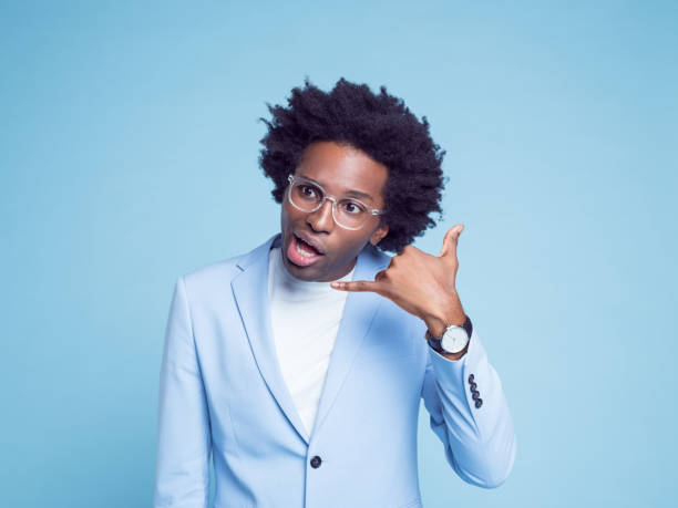 istock Businessman gesturing call me sign 1404099427