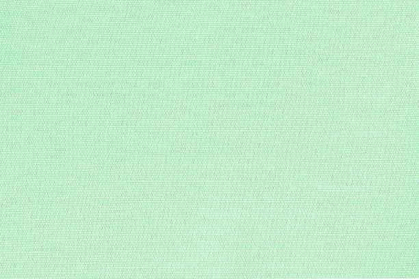 istock Silk fabric wallpaper texture pattern background in light pale blue green teal color 1404104774