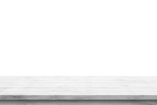 istock Empty white wooden table top isolated on white background 1404104786