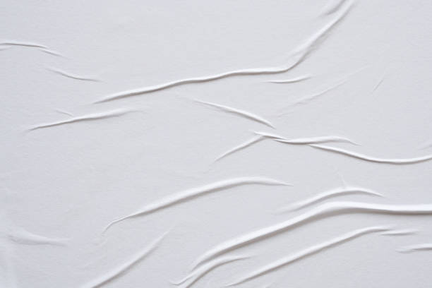 istock white crumpled and creased paper poster texture background 1404104809