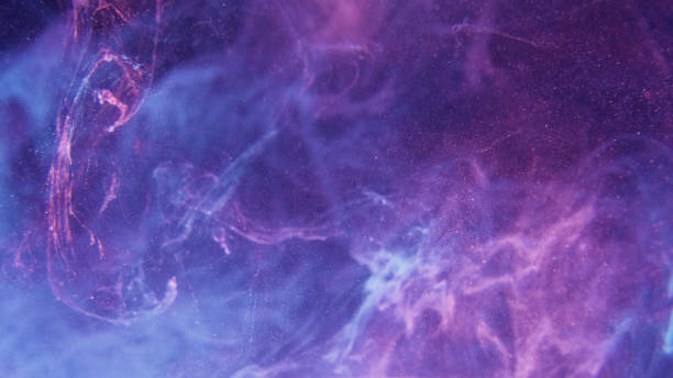 istock neon smoke texture ink water splash purple fog 1404105097