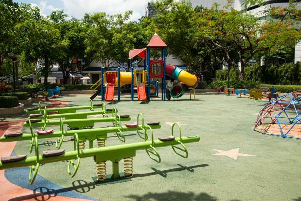 istock Tipping machine up and down vertically for children in the public park. 1404106373