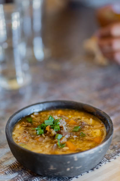 istock Quinoa stew with vegetables and beef llama in a rustic black stoneware pot. Traditional Latin American food. Salta, Argentina. 1404107142