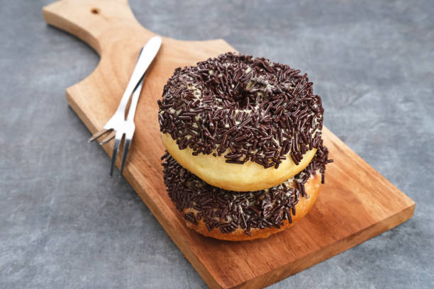 istock Potatoes Donuts with chocolate sprinkles 1404108790