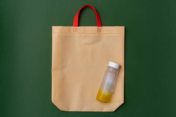 istock Reusable glass bottle and mesh bag flat lay 1404111076