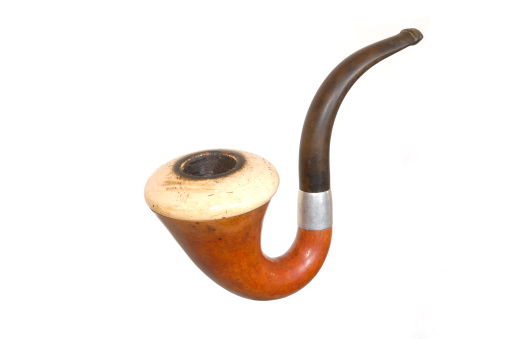 Professional Sherlock Holmes type detective smoking pipe