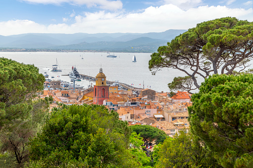 View of the medieval old town and port harbor at the city of Saint-Tropez along the French Riviera and Cote d'Azur of Southern France.