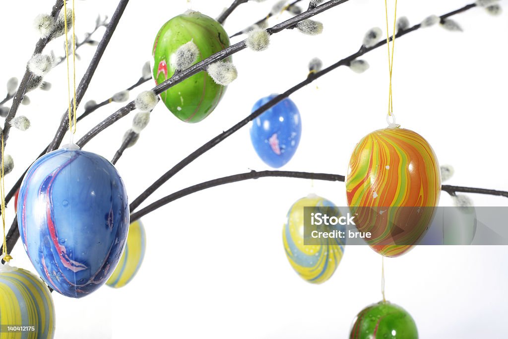 Easter Eggs Easter eggs are hanging on pussy willow. Cut Out Stock Photo