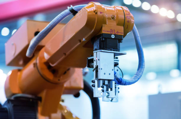 istock Automatic industrial robotic robot working, industry 4.0 and technology concept 1404125997