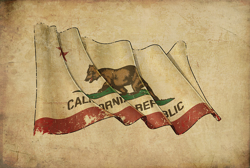 Textured aged Papyrus Background with a scratched illustration of the Waving Flag of the State of California