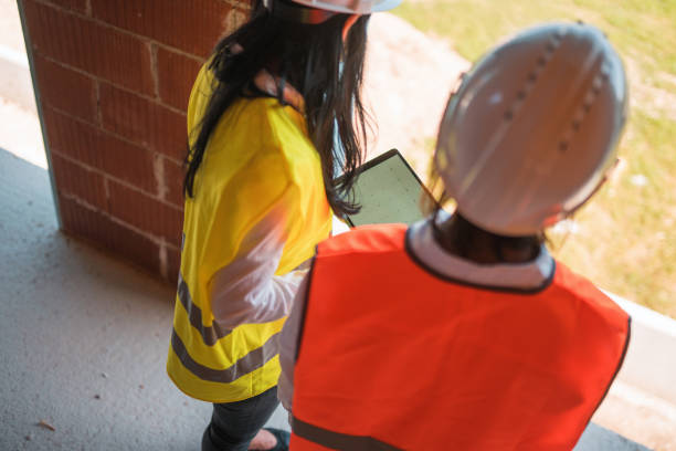 istock High Angle View of Female Architects Using a Digital Tablet 1404132569