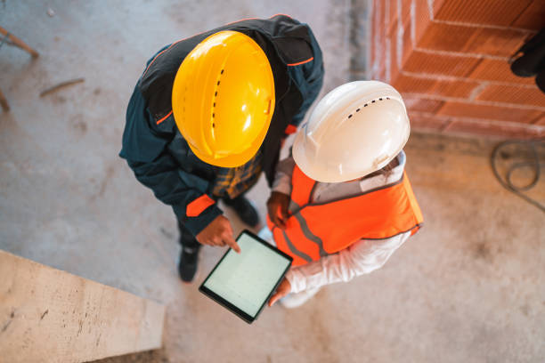 istock High Angle View of Architects Working with a Digital Tablet 1404132605
