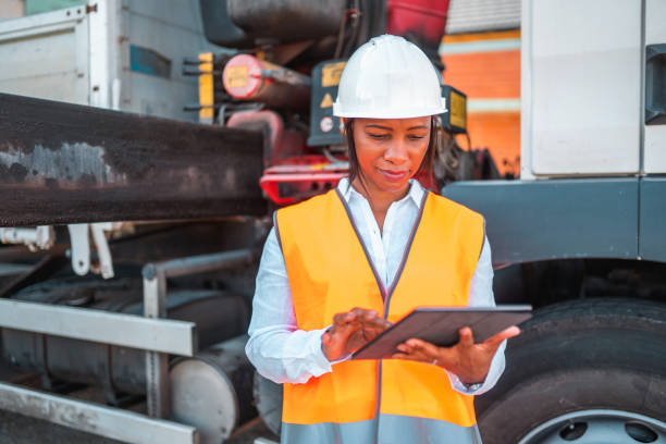 istock Portrait of a Confident Black Female Engineer Using a Digital Tablet on Site 1404132615