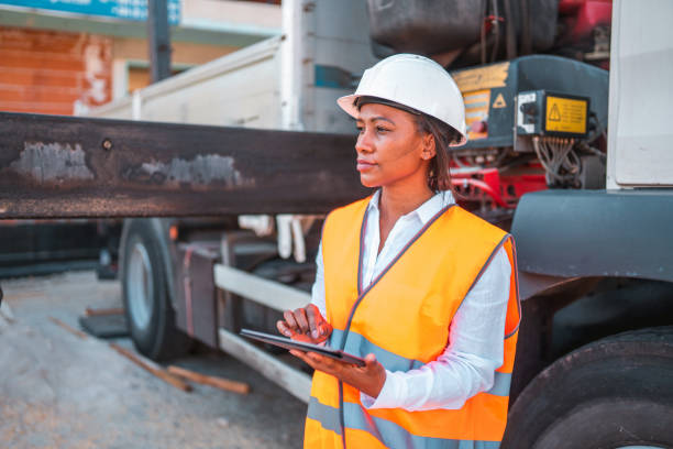 istock Portrait of a Confident Black Female Engineer Using a Digital Tablet on Site 1404132633