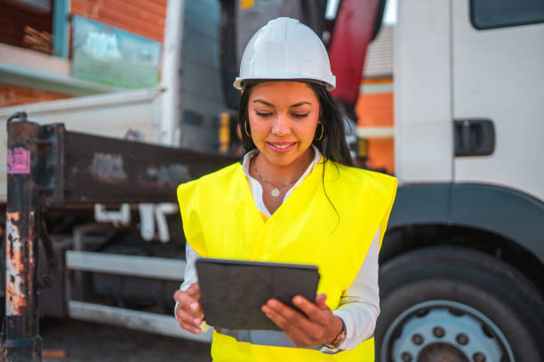 istock Portrait of a Skillful Latin Female Engineer Using a Digital Tablet 1404132638
