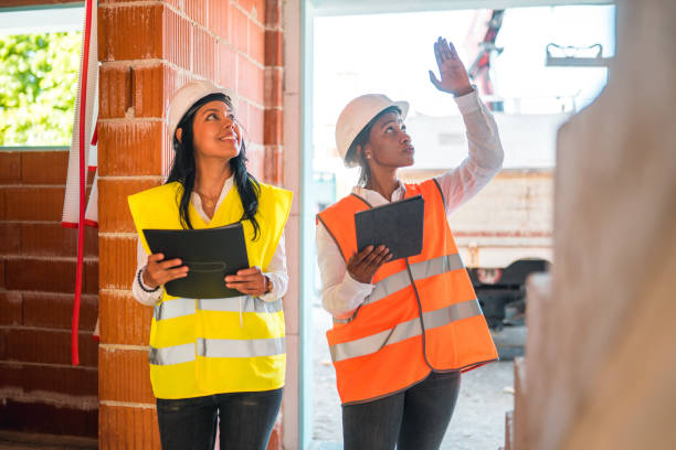 istock Professional Female Architects Sharing Construction Details 1404132692