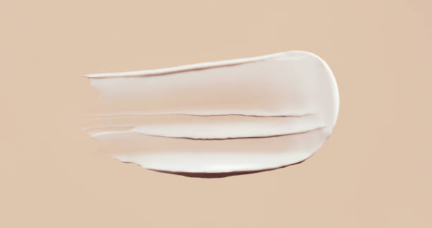 istock cosmetic smear cream texture on pastel beige background 1404133033