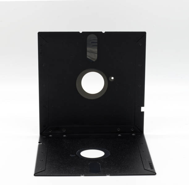 istock Vintage Floppy Disk 5.25 inch. Retro storage technology on white background. 1404135794